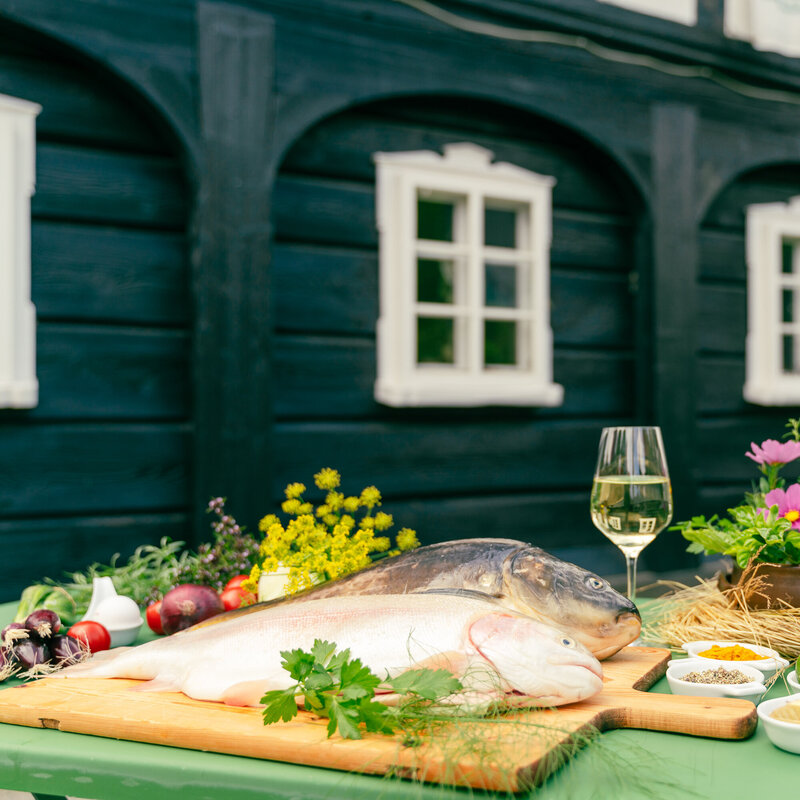 Carp in front of a half-timbered house