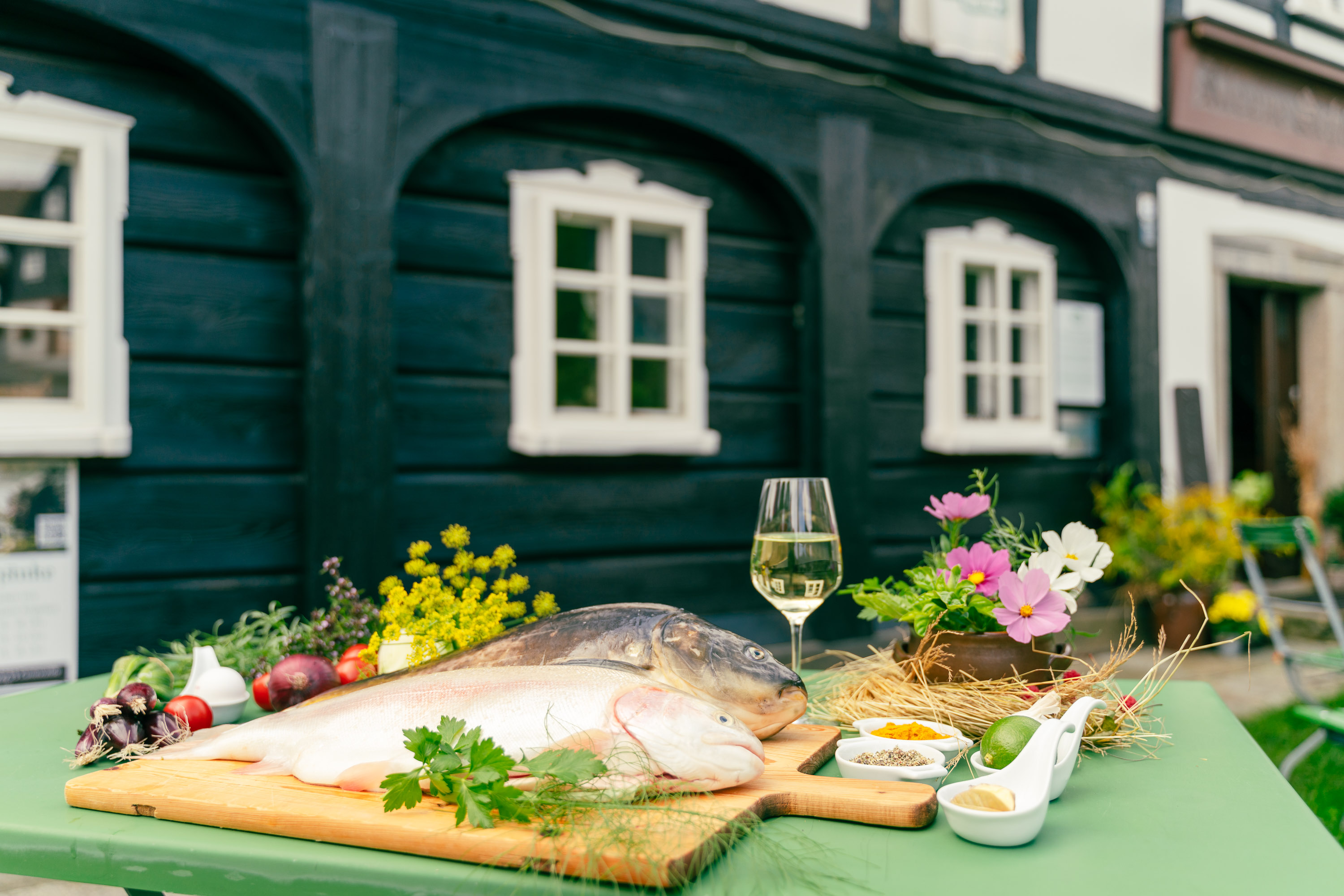 Carp in front of a half-timbered house